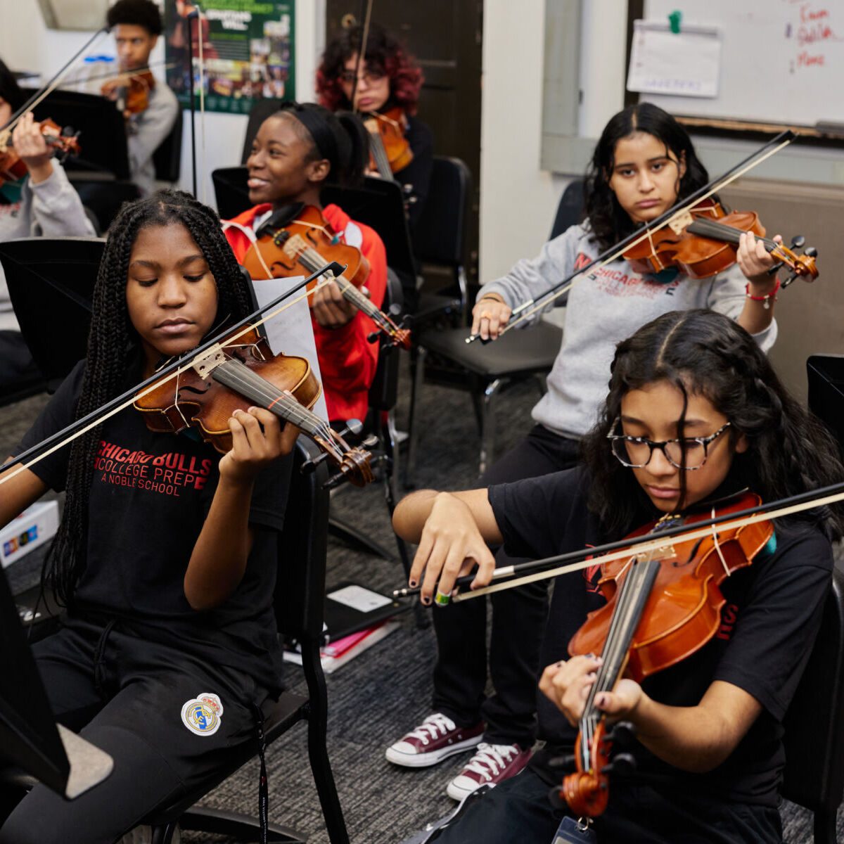 chicago prep high school students playing instruments